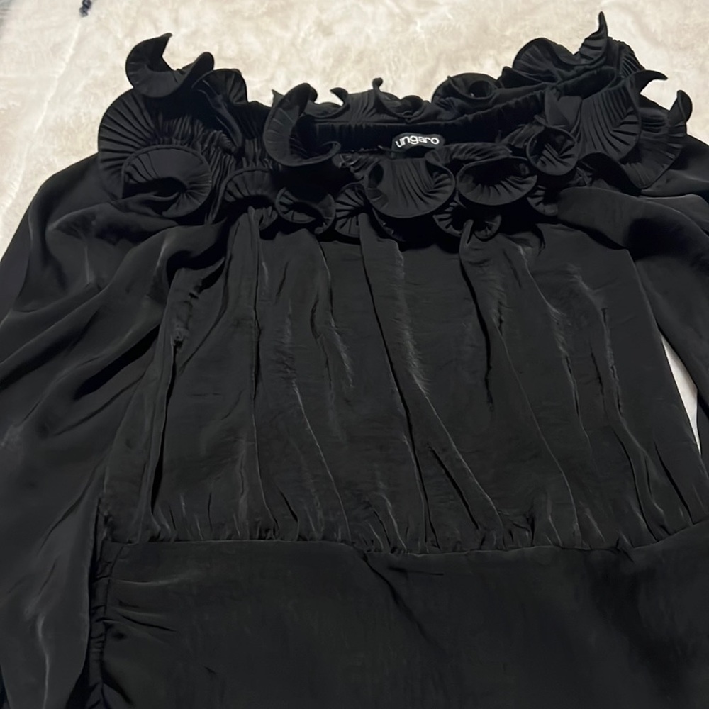 Stunning blouse with beautiful detailed neckline and fitted waist